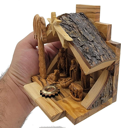 NAT022 Nativity side view showing the natural bark roof and olive-wood stable