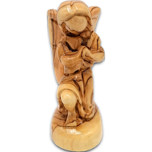 Handcrafted Bethlehem olive wood angel figurine standing 5.4 inches tall with natural grain patterns and lacquer finish.
