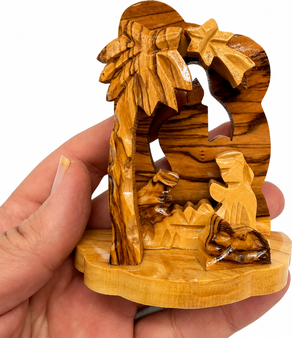 Candle Nativity held in hands to show size, hand carved olive wood from Bethlehem