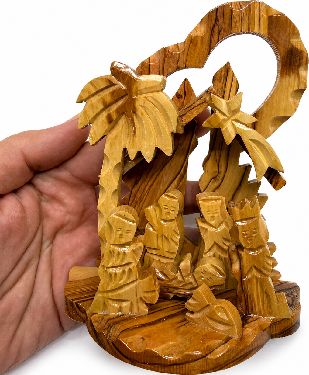 Christmas Keepsake displayed on a Christmas mantel, hand carved olive wood Bethlehem nativity