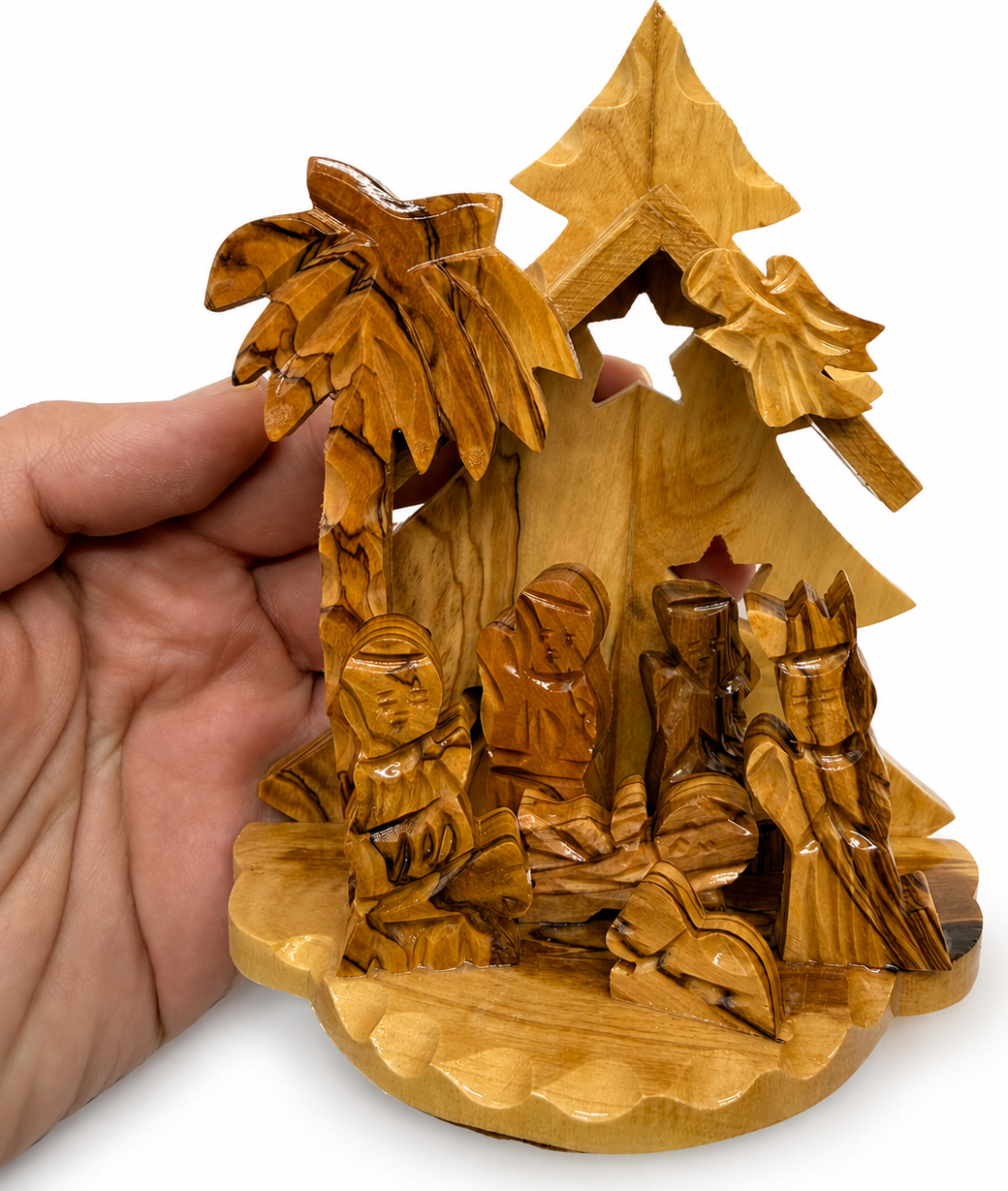 Christmas Tree Nativity displayed on a Christmas mantel, hand carved olive wood Bethlehem nativity