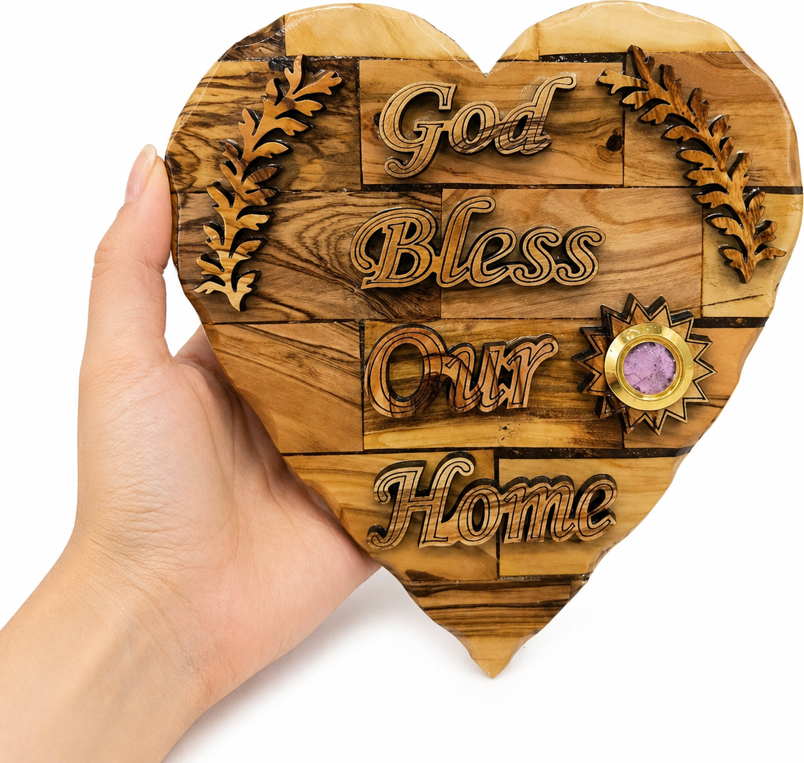 Hand carved olive branches detail on olive wood God Bless Our Home heart plaque, Bethlehem
