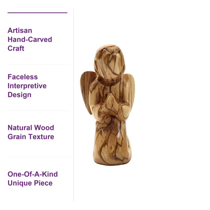 Close-up of hand carved faceless angel revealing rich olive wood grain patterns crafted by local Bethlehem artisans.