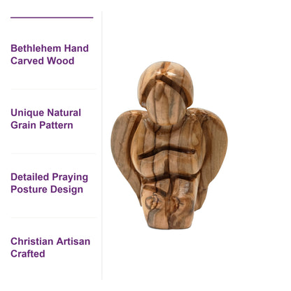 Close-up of unique olive wood grain on a hand carved Bethlehem angel, showcasing authentic Holy Land craftsmanship.