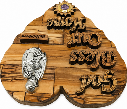 Olive wood grain detail of Holy Family heart plaque showing organic figure variation, Bethlehem