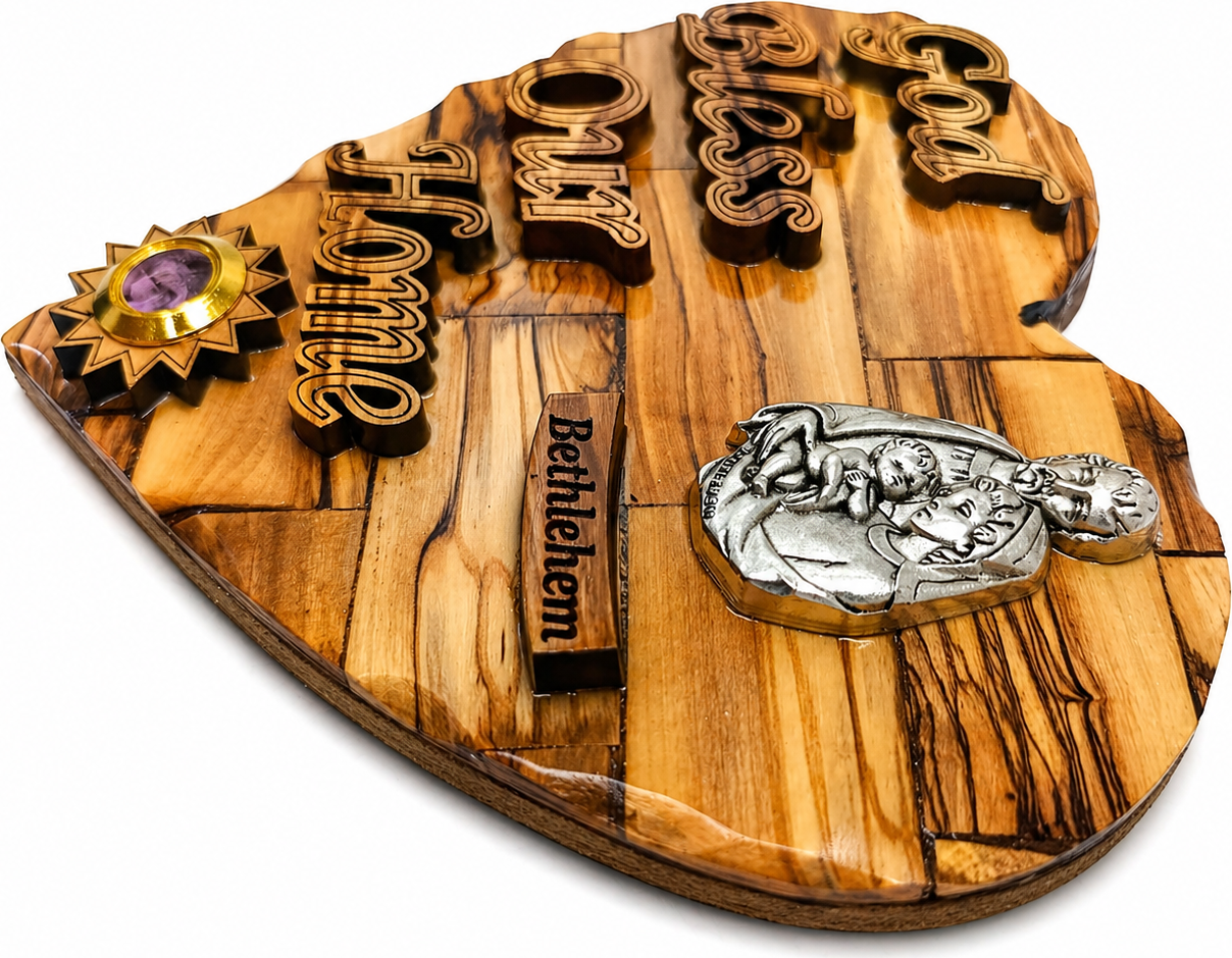 Olive wood Holy Family heart plaque side angle showing pewter medallion and frankincense capsule depth, Bethlehem