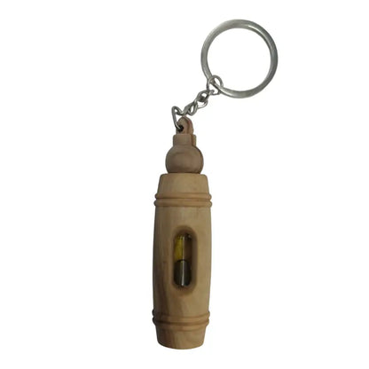 Handcrafted olive wood keychain with encased pure oil – unique and symbolic gift keychain