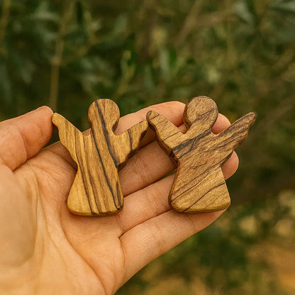 Handheld olive wood guardian angel figurine from zuluf