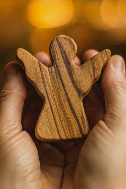 Handheld olive wood guardian angel figurine from zuluf