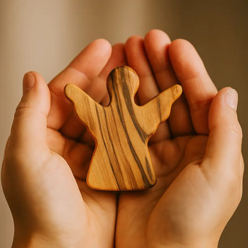 Handheld olive wood guardian angel figurine from zuluf