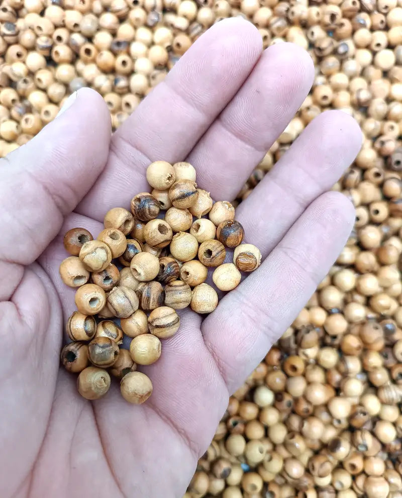 Handmade olive wood beads from bethlehem and nazareth 7mm round