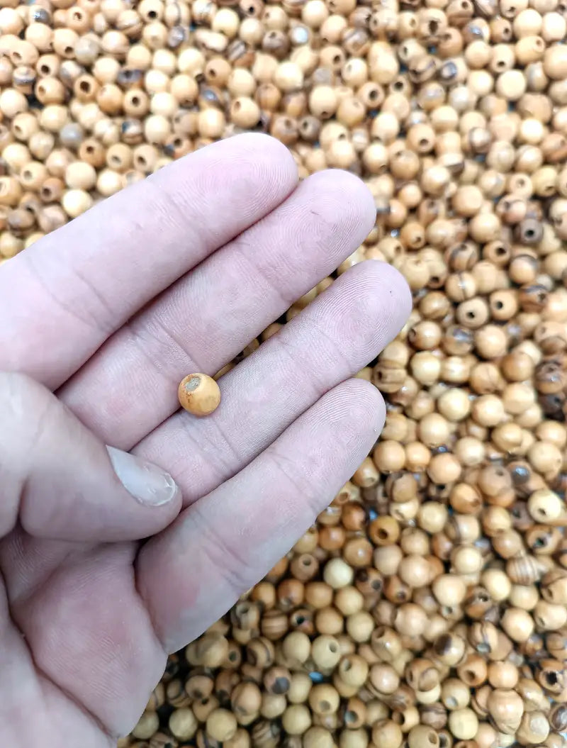 Handmade olive wood beads from bethlehem and nazareth 7mm round