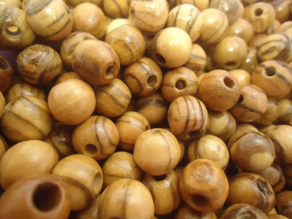 Handmade olive wood beads from bethlehem and nazareth 7mm round