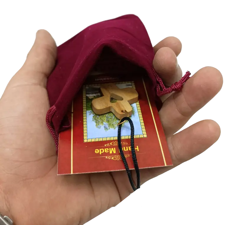 Heart cross pendant crafted from olive wood the holy land