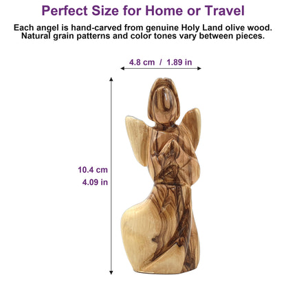 4.1-inch Bethlehem olive wood angel shown beside everyday objects to illustrate its compact, giftable size.