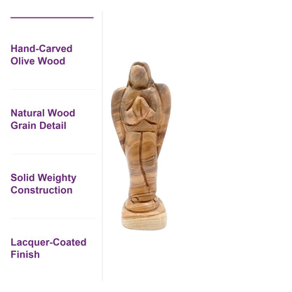 Close-up of the hand-carved olive wood angel figurine showing rich natural grain and solid construction from Bethlehem artisans.
