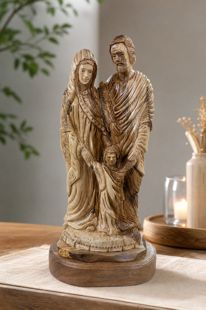 Close view of the large Holy Family olive wood sculpture and natural grain