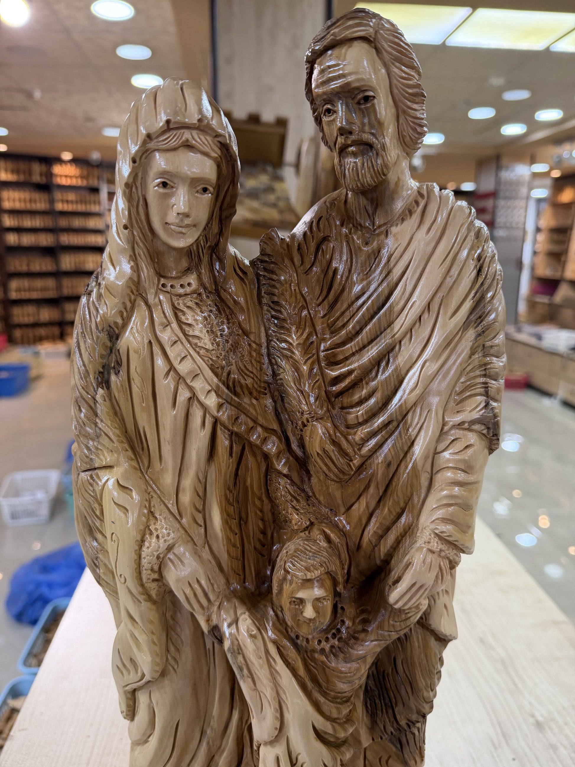 Close view of Mary Joseph and the carved robes on the Holy Family sculpture
