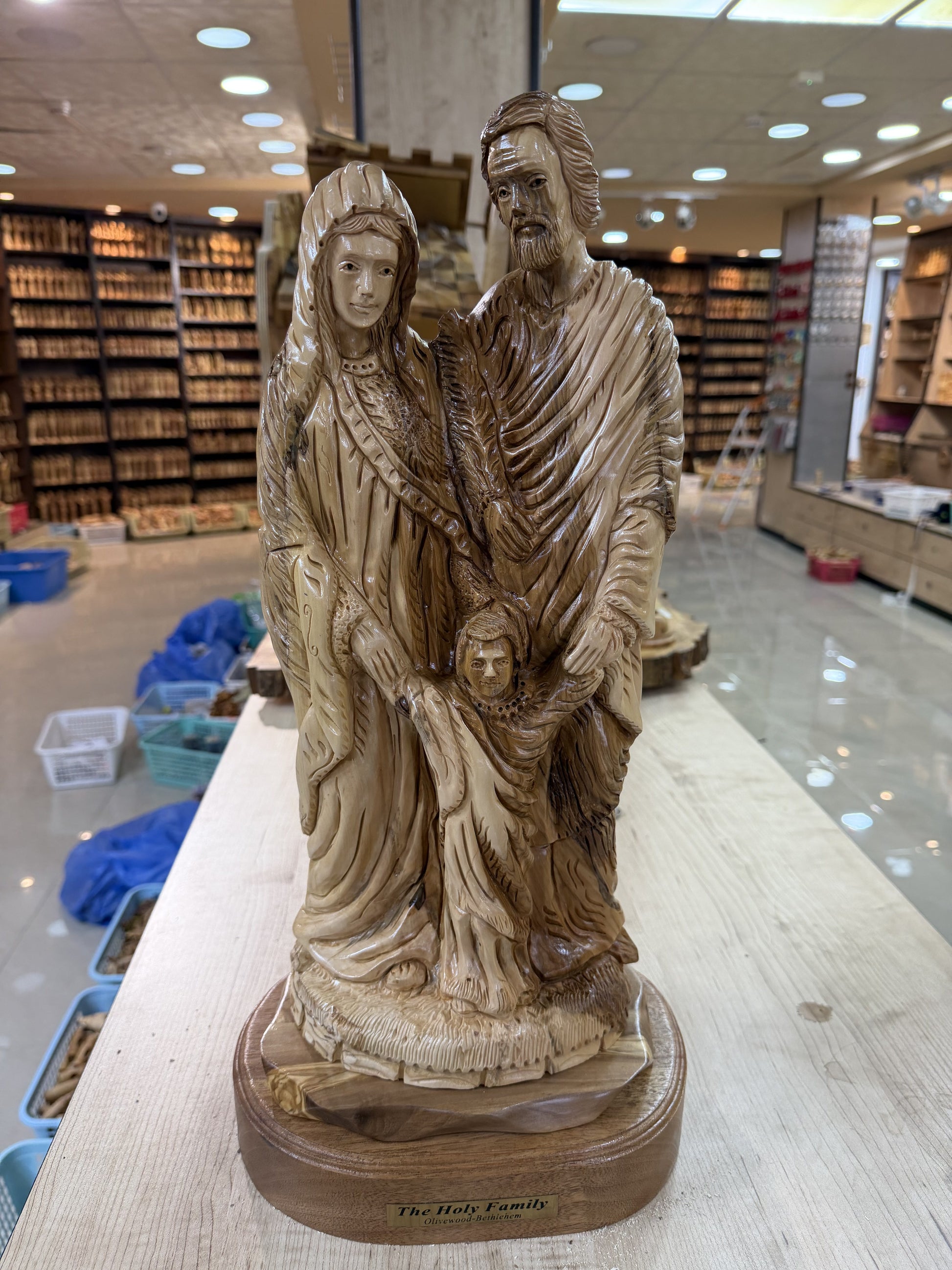 Workshop front view of the large olive wood Holy Family statue