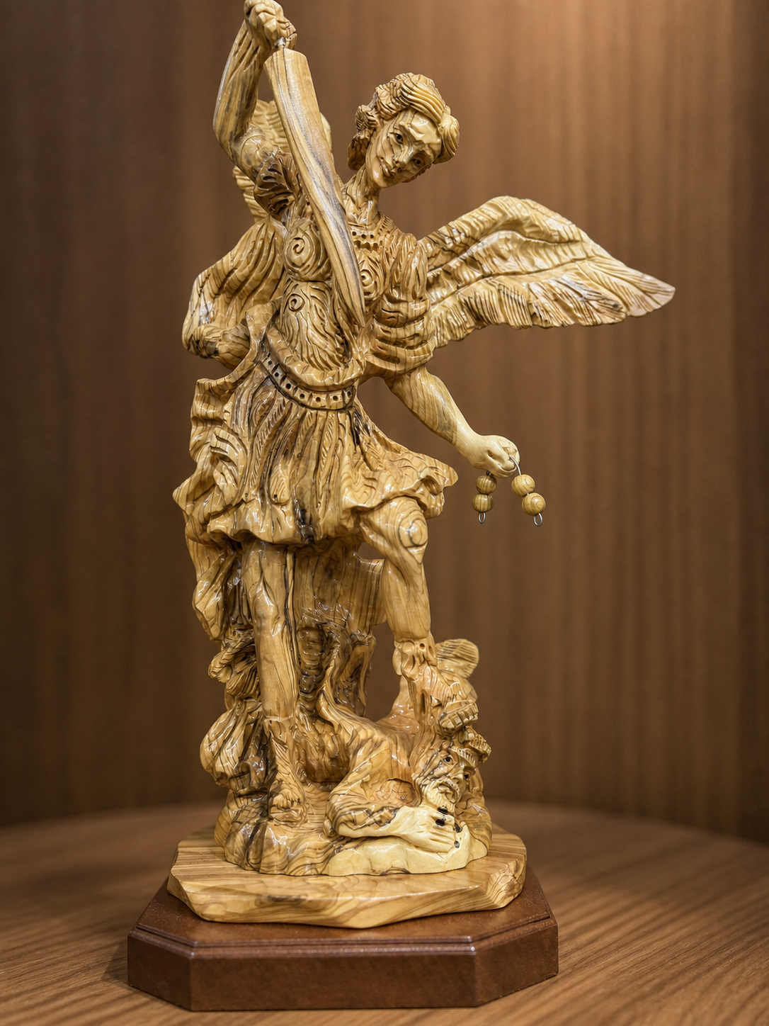 St. Michael Archangel sculpture displayed in warm natural light