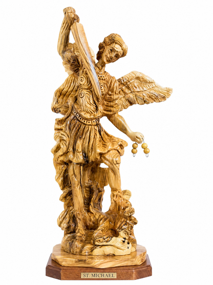 Large olive wood St. Michael Archangel statue from Bethlehem on a white background