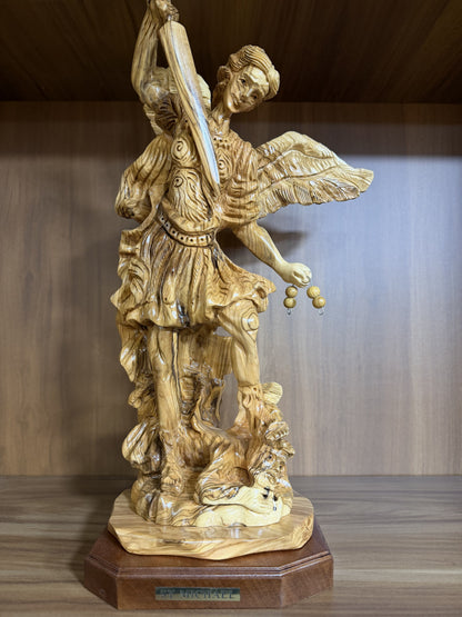 Workshop front view of the large St. Michael Archangel olive wood carving