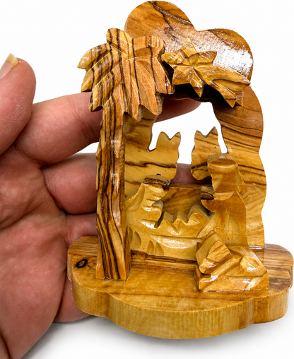 Mini Nativity Set held in hands to show size, hand carved olive wood from Bethlehem