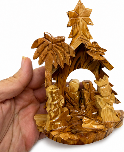 Nativity Stable on a holiday table, hand carved olive wood Bethlehem