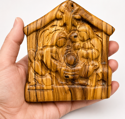 Olive Wood Holy Family held in hands to show size, hand carved olive wood from Bethlehem