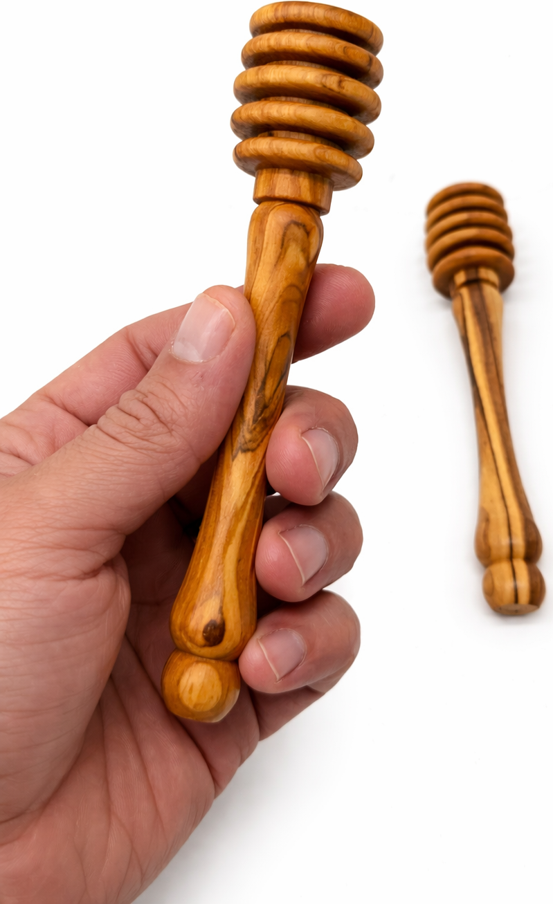 Handmade olive wood honey dipper from Bethlehem side angle from Bethlehem Holy Land