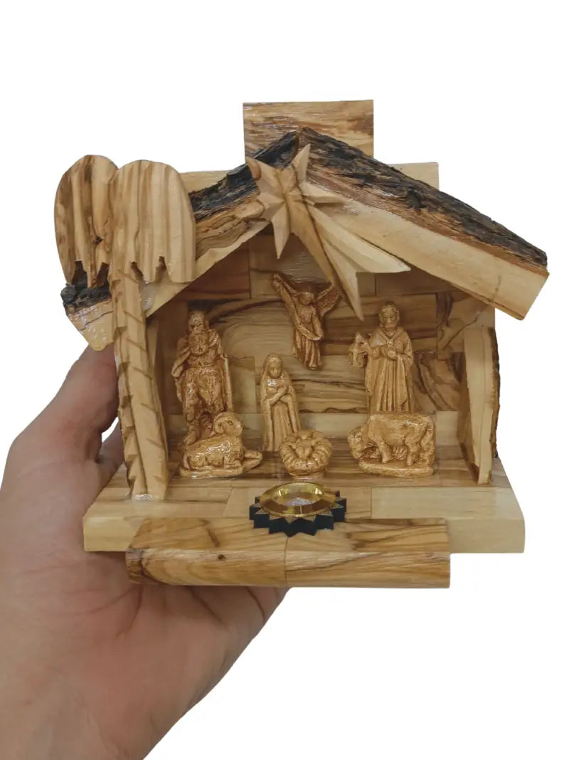 Olive wood nativity scene from bethlehem – gypsum holy family figures in handcrafted manger with bark roof & candle