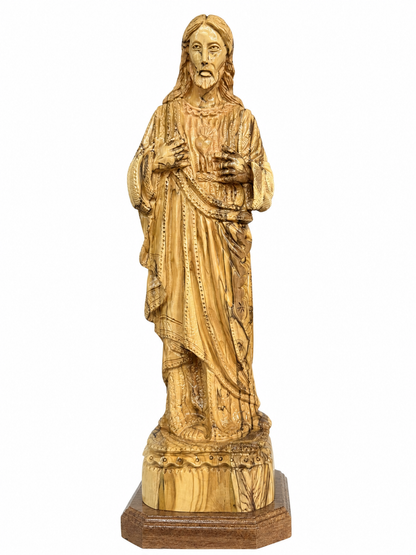 Olive wood Sacred Heart of Jesus statue from Bethlehem on a white background