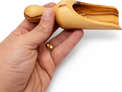 Handmade olive wood spice scoop from Bethlehem side angle from Bethlehem Holy Land