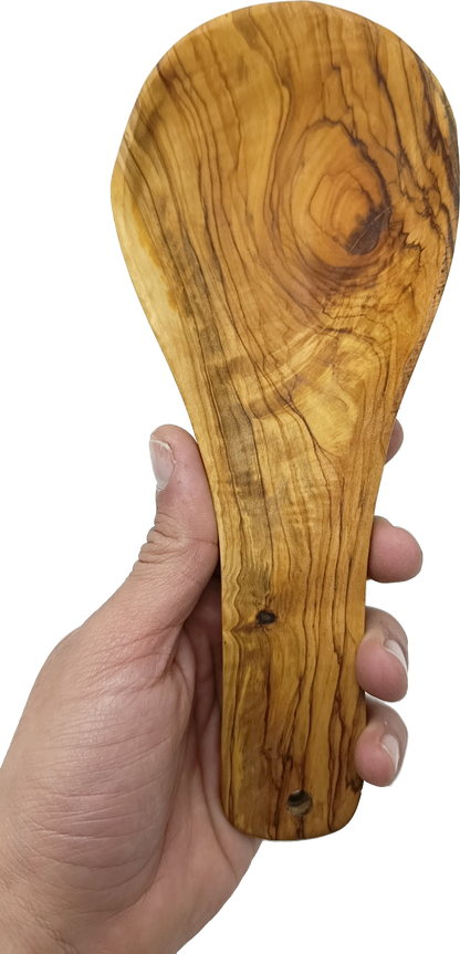 Handmade olive wood spoon rest from Bethlehem detail shot from Bethlehem Holy Land