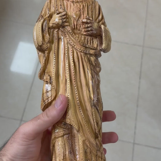 Olive wood Sacred Heart of Jesus statue from Bethlehem shown in a short workshop video