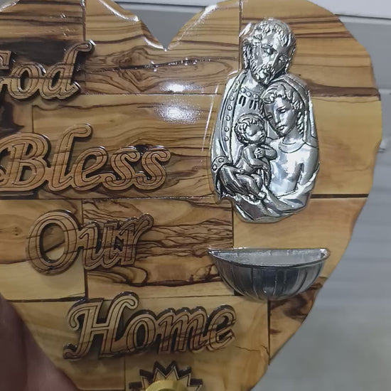 Olive wood Holy Family heart plaque from Bethlehem rotating to show holy water font and grain