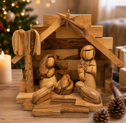Wooden Nativity Stable on a holiday table, hand carved olive wood Bethlehem