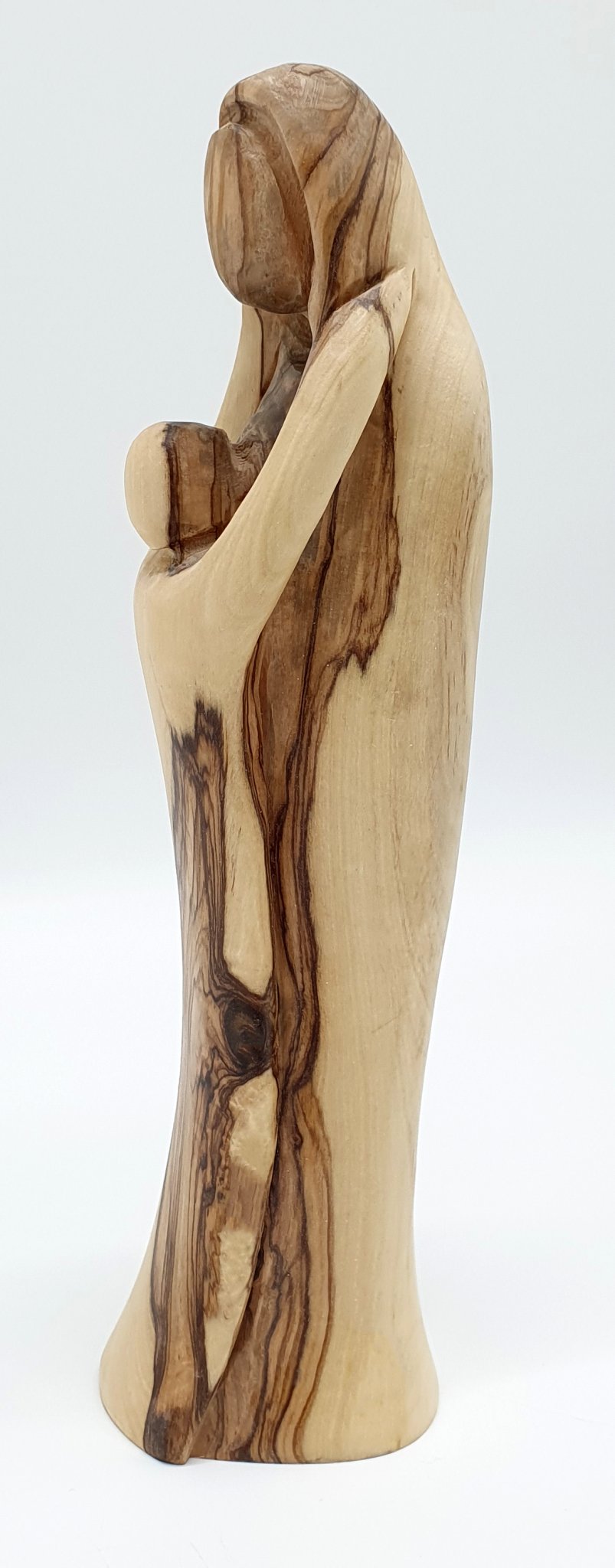 Experience the sublime beauty and intricate detailing of our Mary and Baby Jesus Handcrafted Olivewood Statue by Zuluf - Zuluf